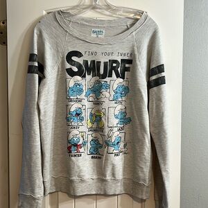 Smurf’s long sleeve. Size large.